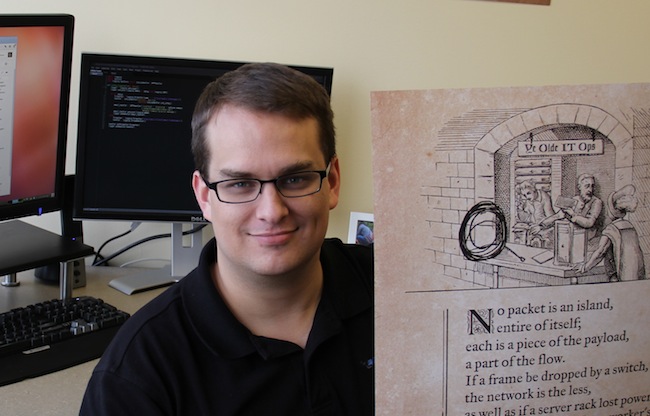 Ben holding poster