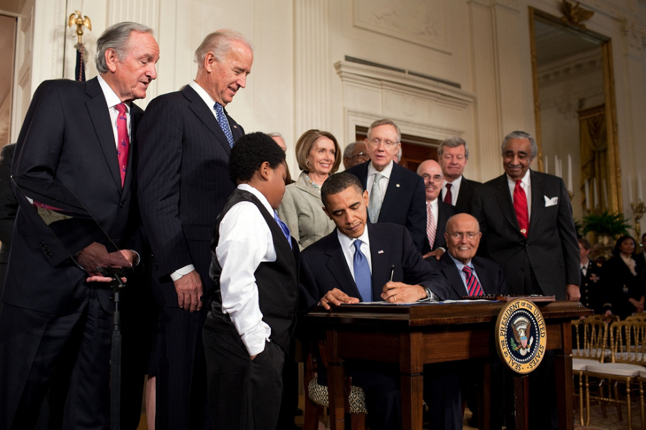 President Obama signing the Affordable Care Act - source: Wikipedia