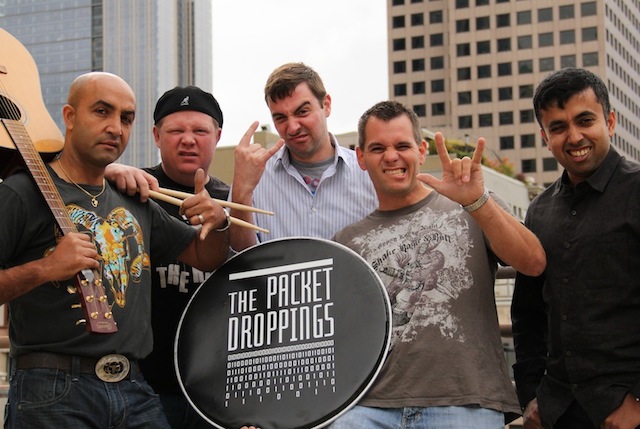 The Packet Droppings, from left to right: Lead Guitar - Bhushan Khanal, Director of Engineering; Drums - Chris Blessington, Senior Director of Marketing; Bass Guitar - Eric Thomas, Principal Solutions Architect; Lead Singer - Kurt Shubert, Director of Customer Support; Keyboard - Raja Mukerji, Co-Founder and President